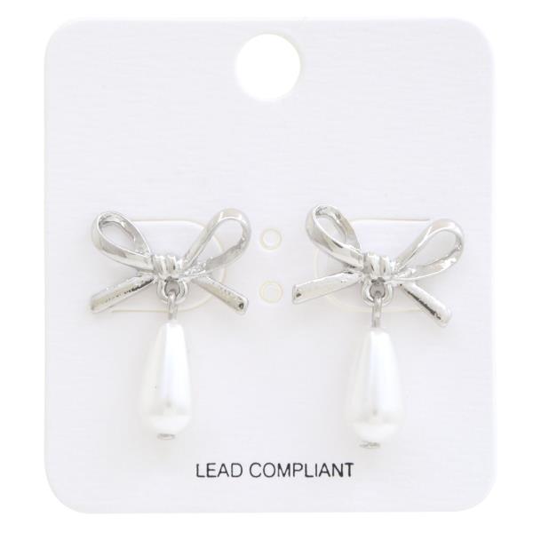 METAL RIBBON BOW WITH PEARDROP PEARL DANGLE EARRING