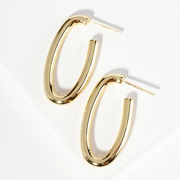 GOLD DIPPED METAL OVAL HOOP EARRING