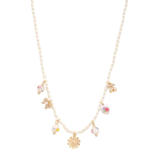 FLOWER CHARM PEARL BEAD NECKLACE