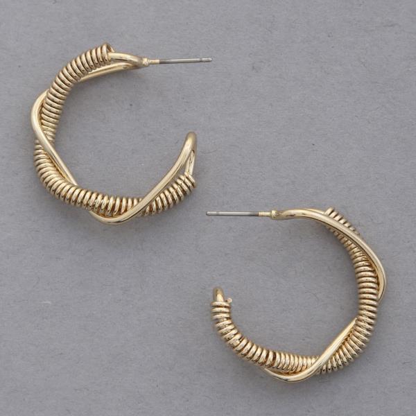 COIL SOLID TWISTED OPEN HOOP EARRING