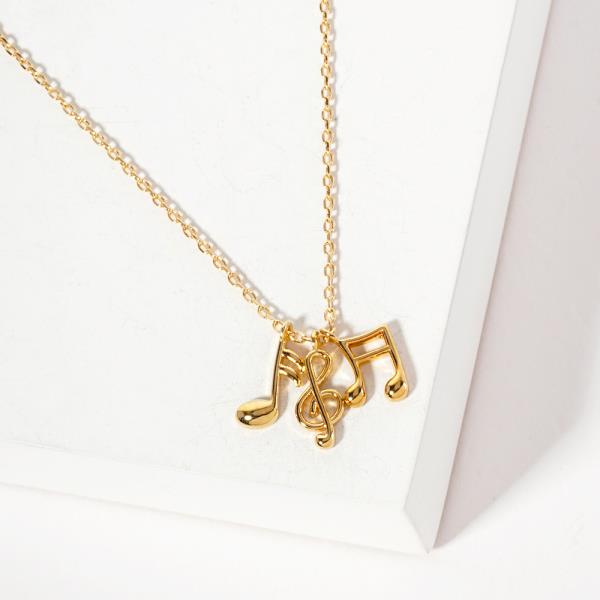 18K GOLD RHODIUM SILENCE IN BETWEEN MUSICAL NOTE NECKLACE