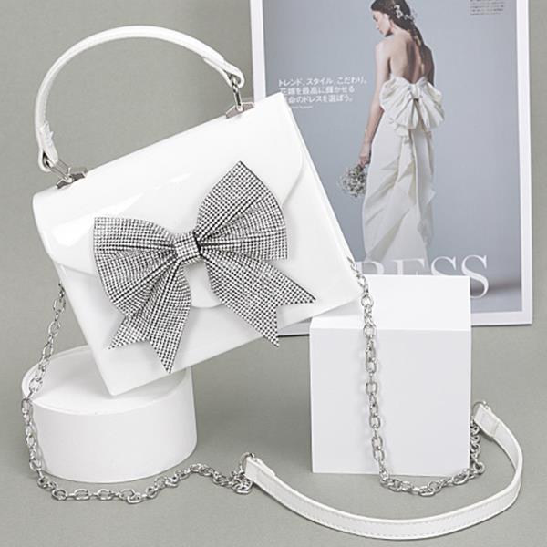 ENAMEL RHINESTONE RIBBON TOP HANDLE CLUTCH