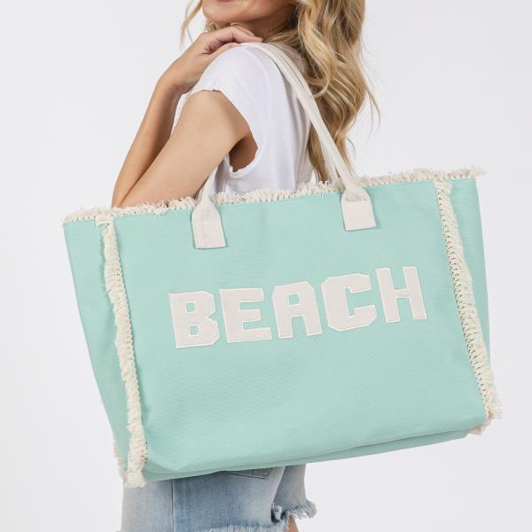 EMBROIDERED BEACH LETTER FRINGE TOTE BAG