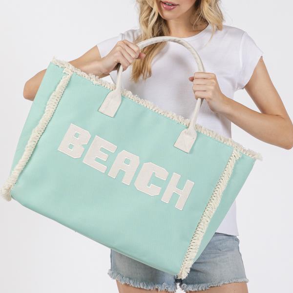 EMBROIDERED BEACH LETTER FRINGE TOTE BAG