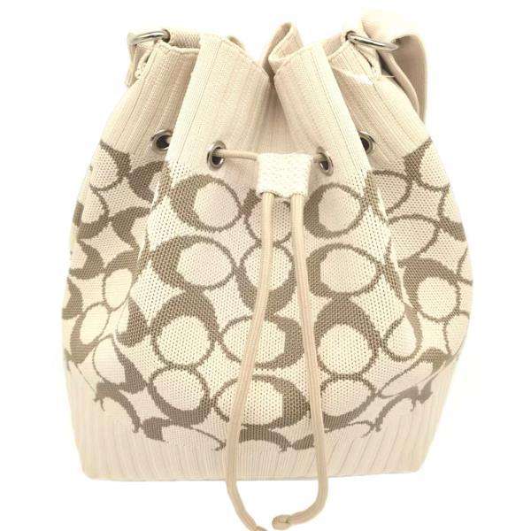 KNIT DRAWSTRING BUCKET BAG WITH CIRCLE PATTERN DESIGN